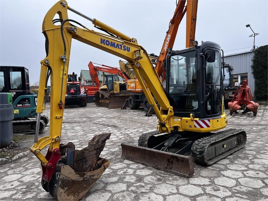 2011 Komatsu PC35MR-3 mini excavator, front three-quarter view