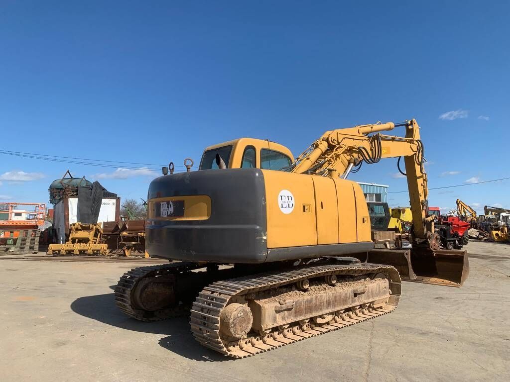 2007 New Holland E145 crawler excavator rear three-quarter view 2007 New Holland E145 crawler excavator rear three-quarter view