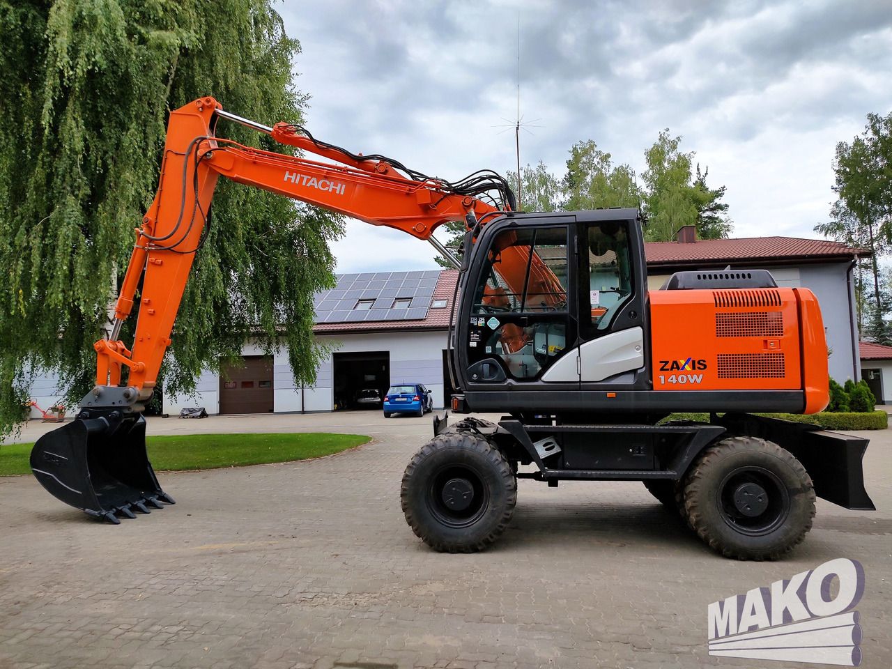 2016 Hitachi Zaxis 140W wheel excavator side view