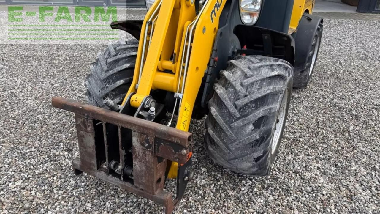2014 Mustang AL 306 mini excavator front view with attachment 2014 Mustang AL 306 mini excavator front view with attachment