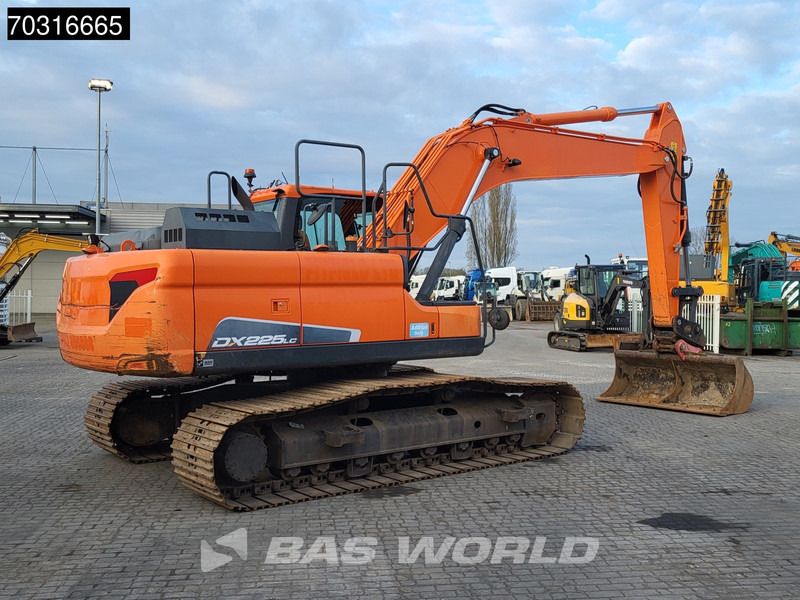 2020 Doosan DX225LC-5 crawler excavator, rear three-quarter view 2020 Doosan DX225LC-5 crawler excavator, rear three-quarter view