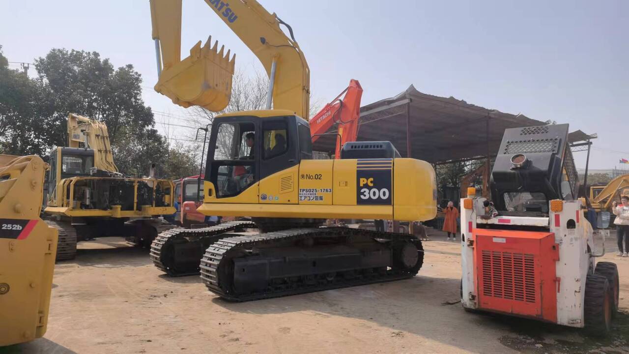 2011 Komatsu PC300-7 crawler excavator, side profile view