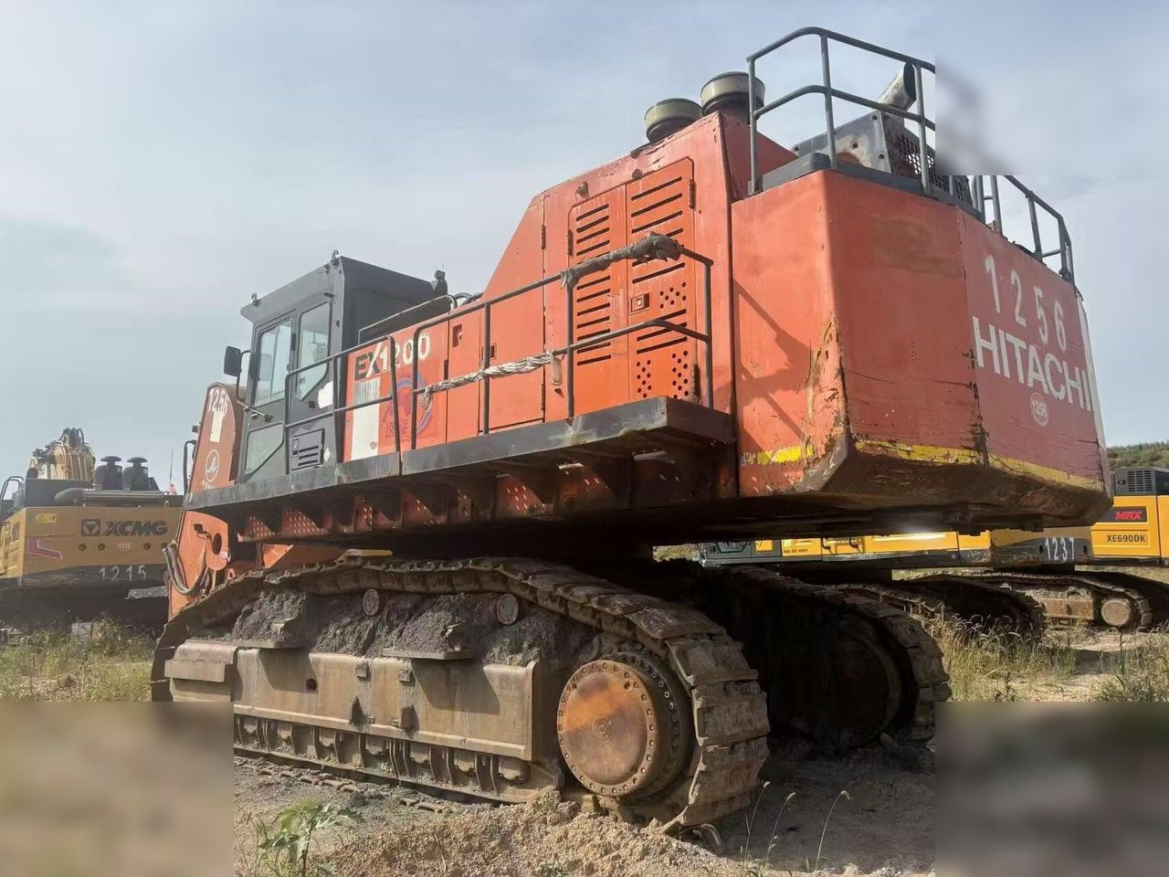 2010 Hitachi EX1200-6 crawler excavator, rear three-quarter view 2010 Hitachi EX1200-6 crawler excavator, rear three-quarter view