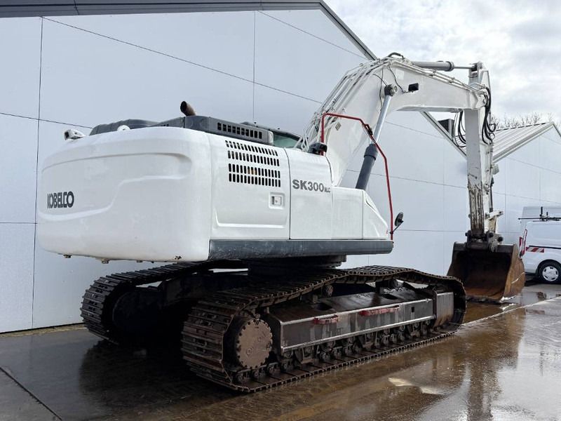 2015 Kobelco SK300NLC-10 crawler excavator, rear three-quarter view 2015 Kobelco SK300NLC-10 crawler excavator, rear three-quarter view