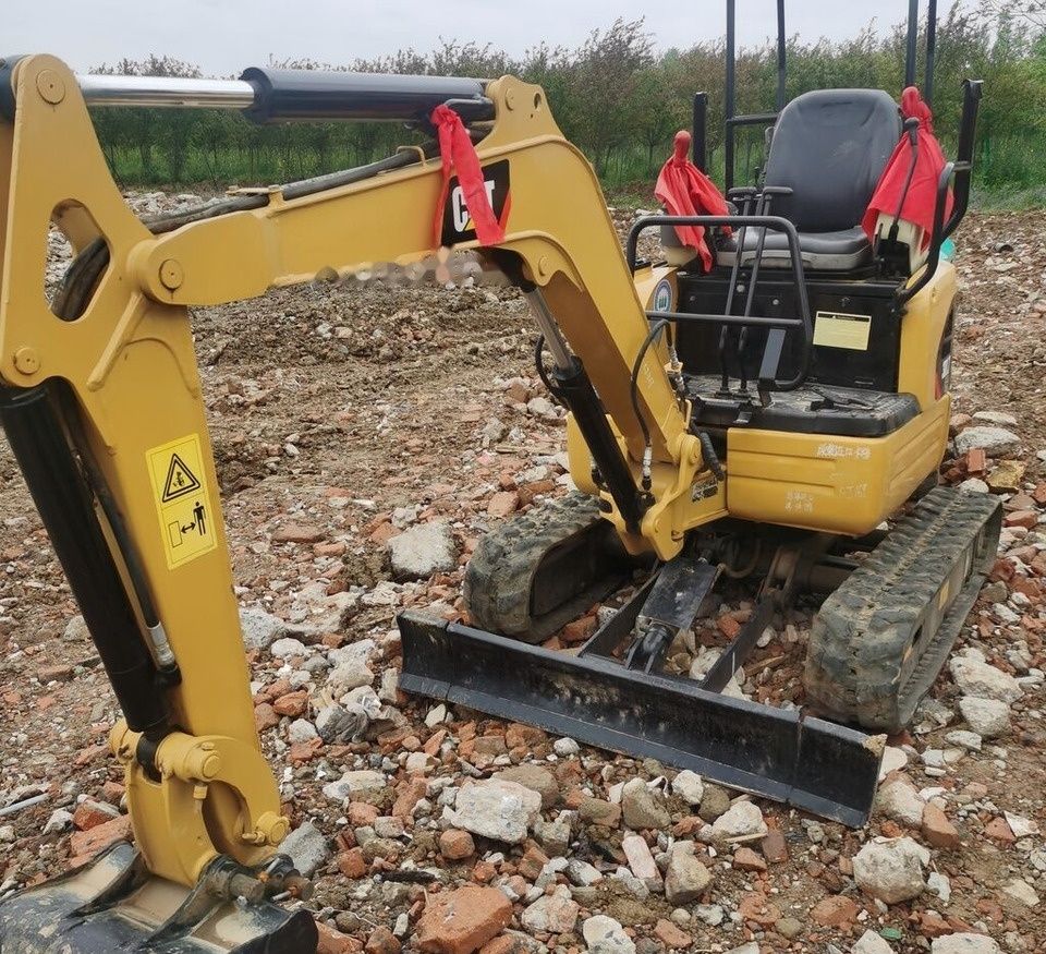Caterpillar 301.7 mini excavator, front three-quarter view Caterpillar 301.7 mini excavator, front three-quarter view