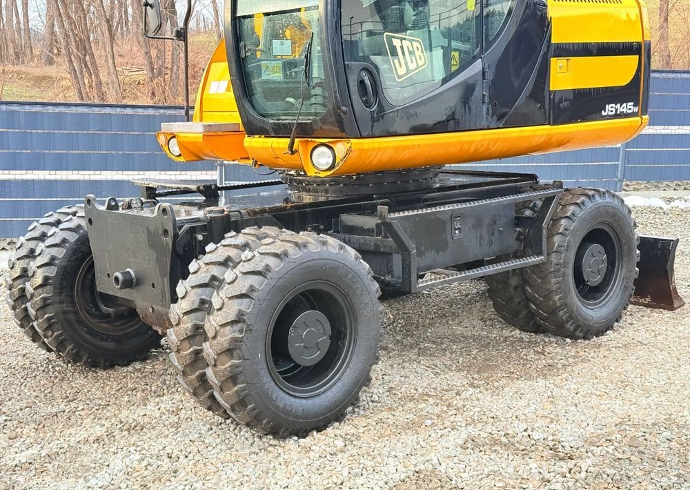 2011 JCB JS145W wheel excavator side view