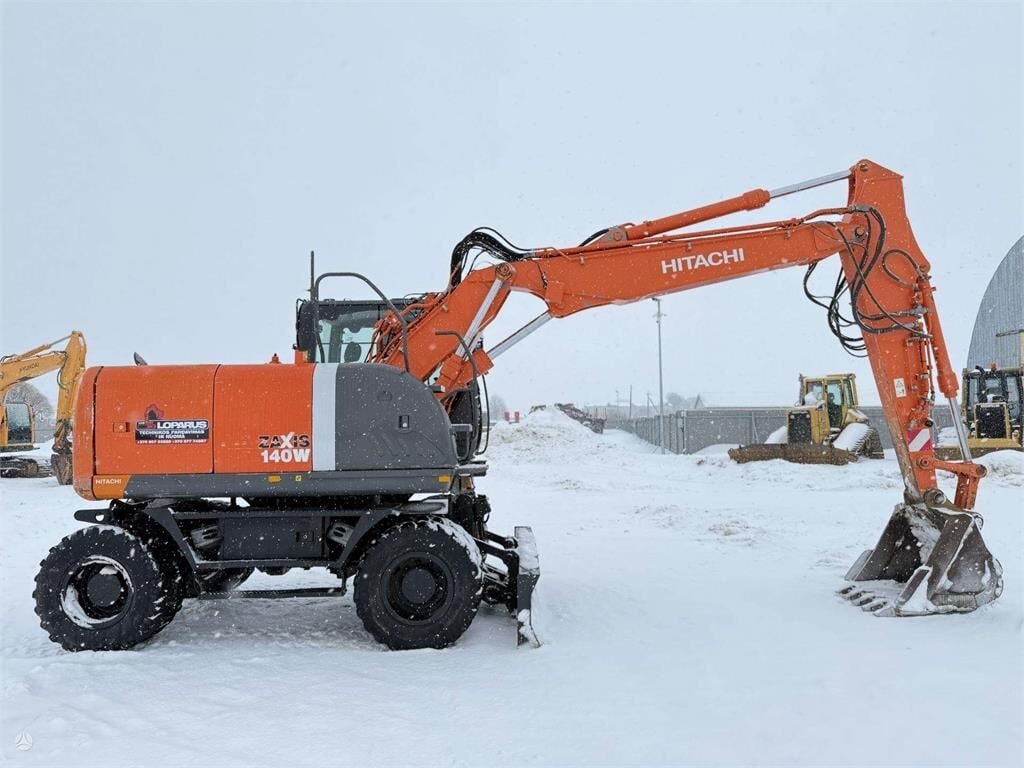 2010 Hitachi Zaxis 140W wheel excavator, side profile view 2010 Hitachi Zaxis 140W wheel excavator, side profile view