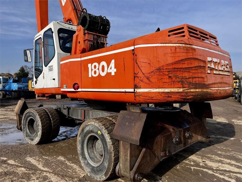 1994 Atlas 1804MI material handler, rear three-quarter view