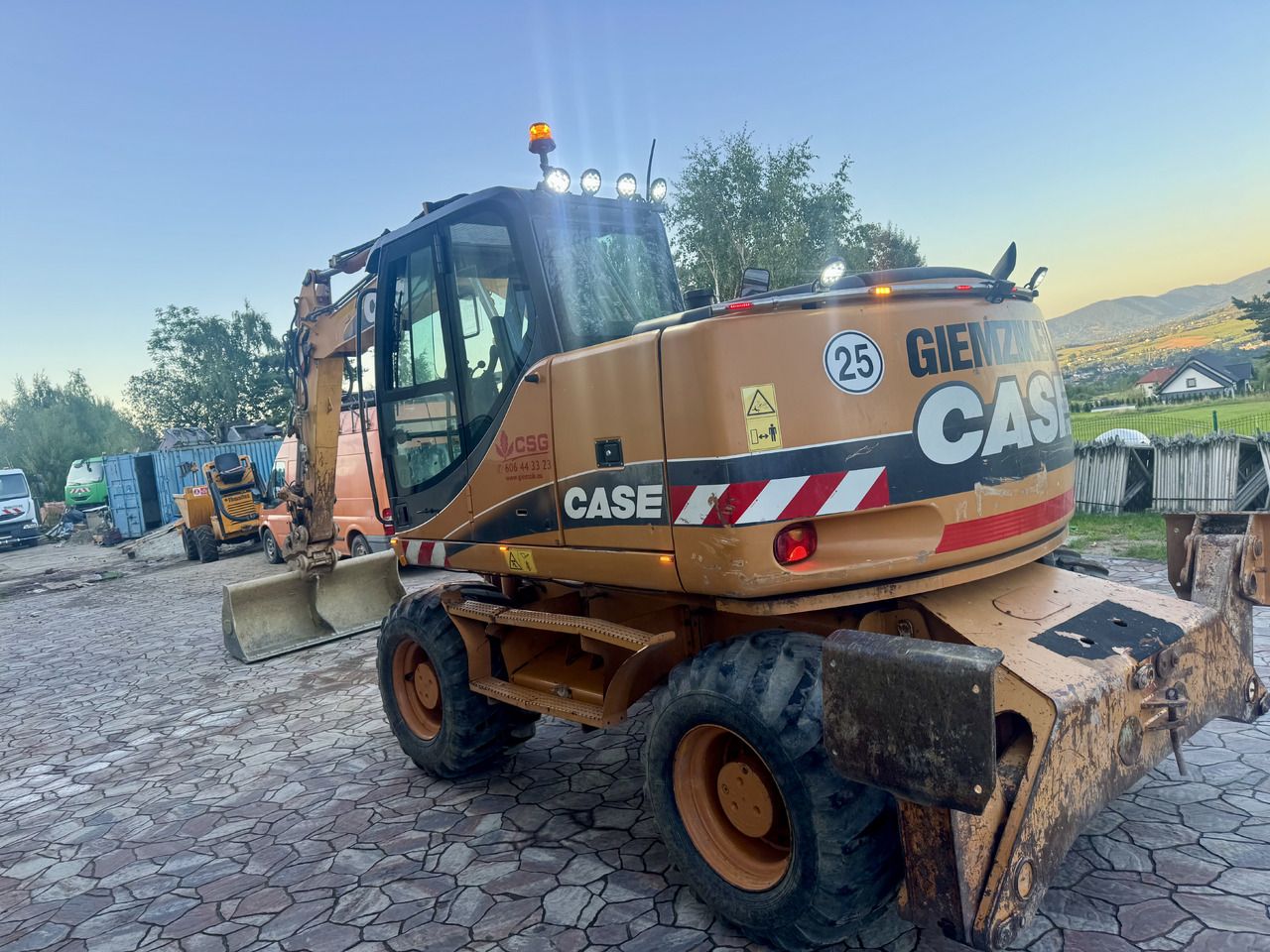 2006 CASE WX145 wheel excavator, rear three-quarter view 2006 CASE WX145 wheel excavator, rear three-quarter view