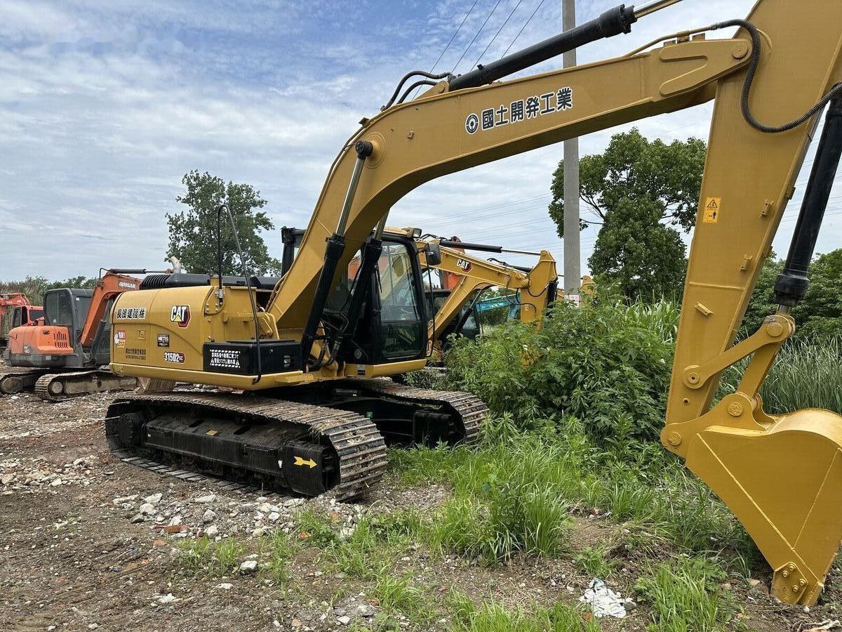 Caterpillar 315D2GC crawler excavator, side view Caterpillar 315D2GC crawler excavator, side view