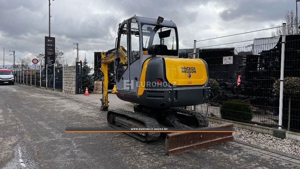 2017 Wacker Neuson 3503 VDS CAB mini excavator rear three-quarter view 2017 Wacker Neuson 3503 VDS CAB mini excavator rear three-quarter view