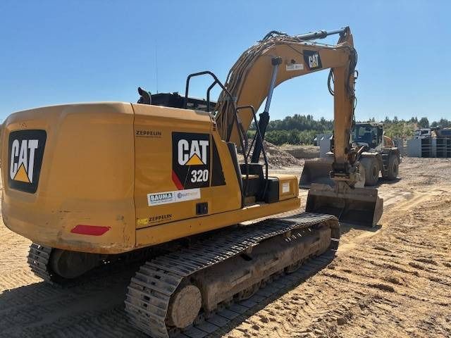 2019 Caterpillar 320-07 crawler excavator, rear three-quarter view 2019 Caterpillar 320-07 crawler excavator, rear three-quarter view