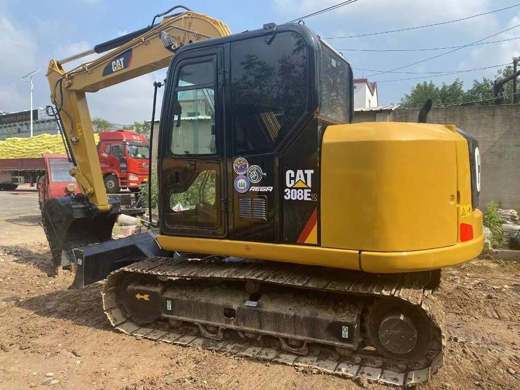 2024 Caterpillar 308E2 mini excavator, side view 2024 Caterpillar 308E2 mini excavator, side view
