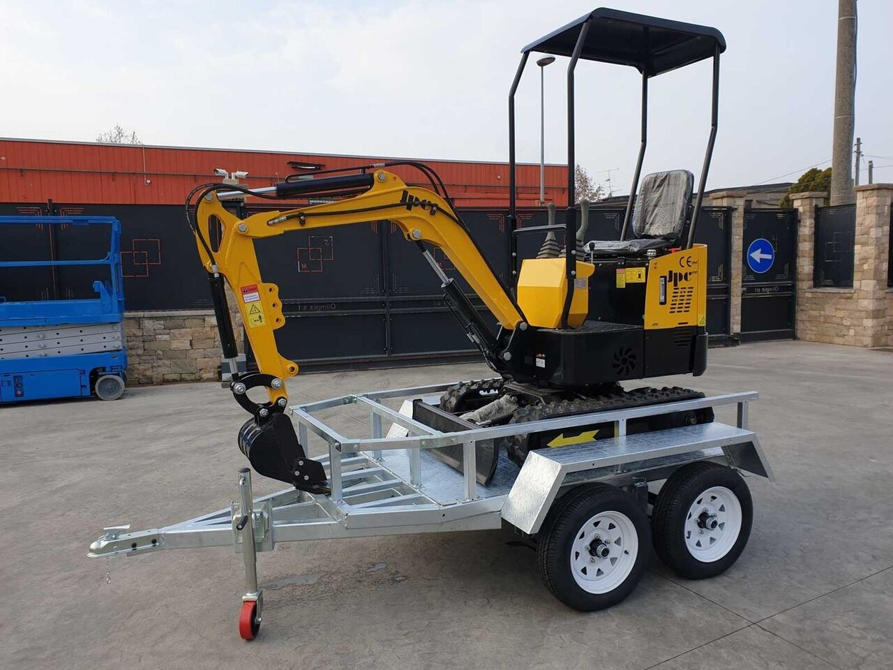 JPC HT-12 mini excavator on trailer