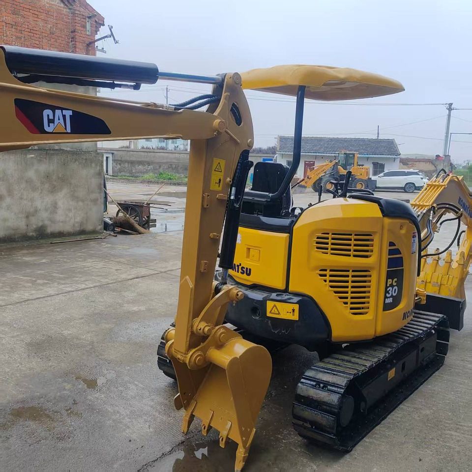 2022 Komatsu PC30MR mini excavator, rear three-quarter view 2022 Komatsu PC30MR mini excavator, rear three-quarter view