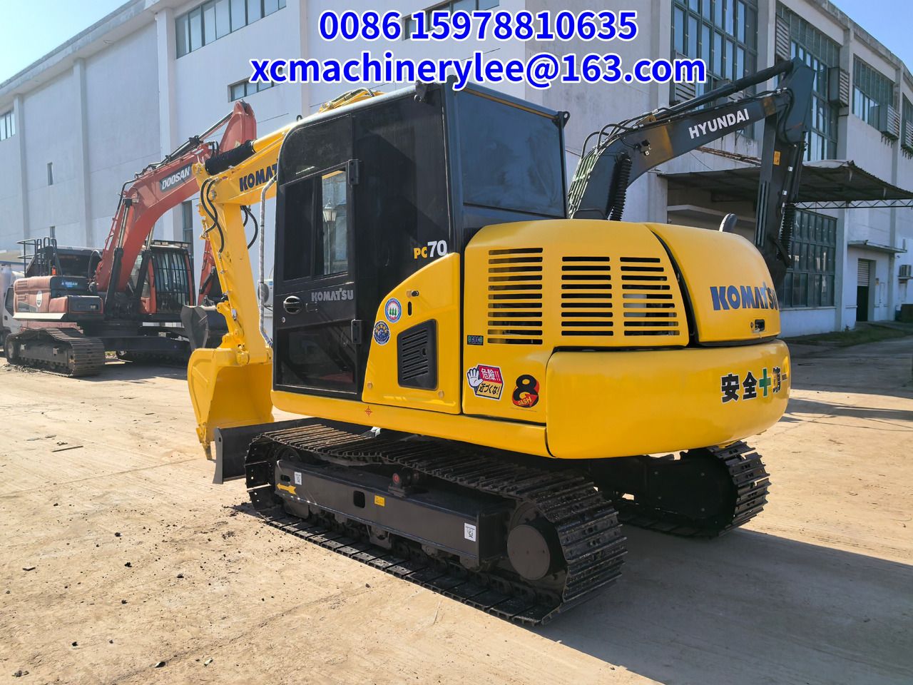 2024 Komatsu PC70 crawler excavator, rear three-quarter view