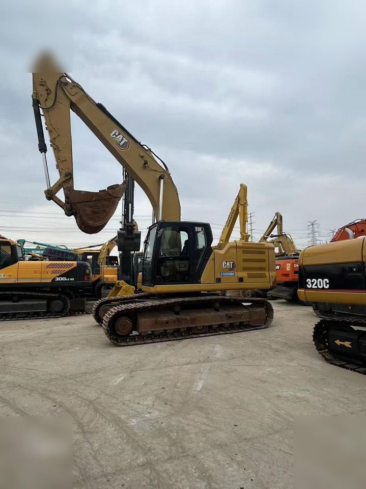 2019 Caterpillar 330 crawler excavator, side view