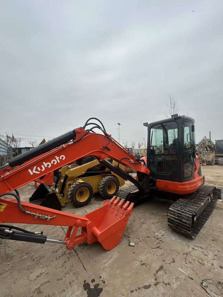 2024 Kubota U55-4 mini excavator, side profile view 2024 Kubota U55-4 mini excavator, side profile view