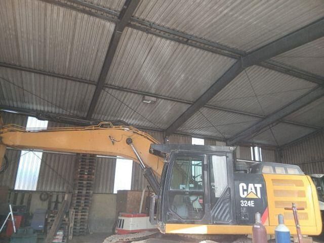 2011 Caterpillar 324E crawler excavator, side view