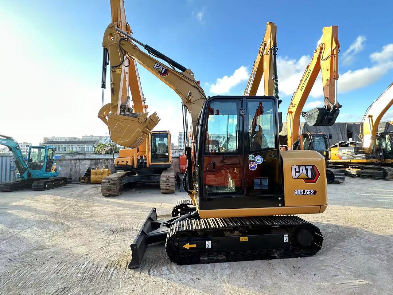 2022 Caterpillar 305.5E2 excavator, side view 2022 Caterpillar 305.5E2 excavator, side view