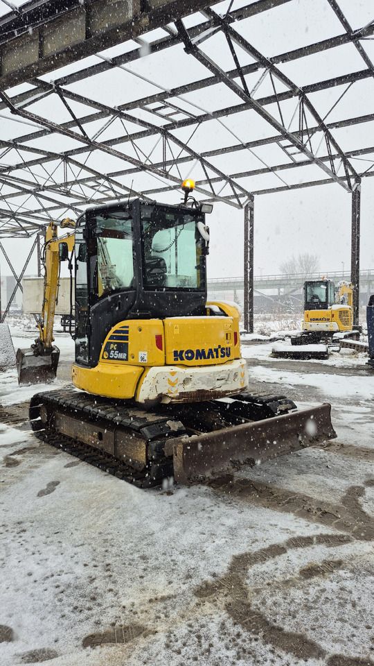 2020 Komatsu PC55MR-5 mini excavator, rear three-quarter view 2020 Komatsu PC55MR-5 mini excavator, rear three-quarter view