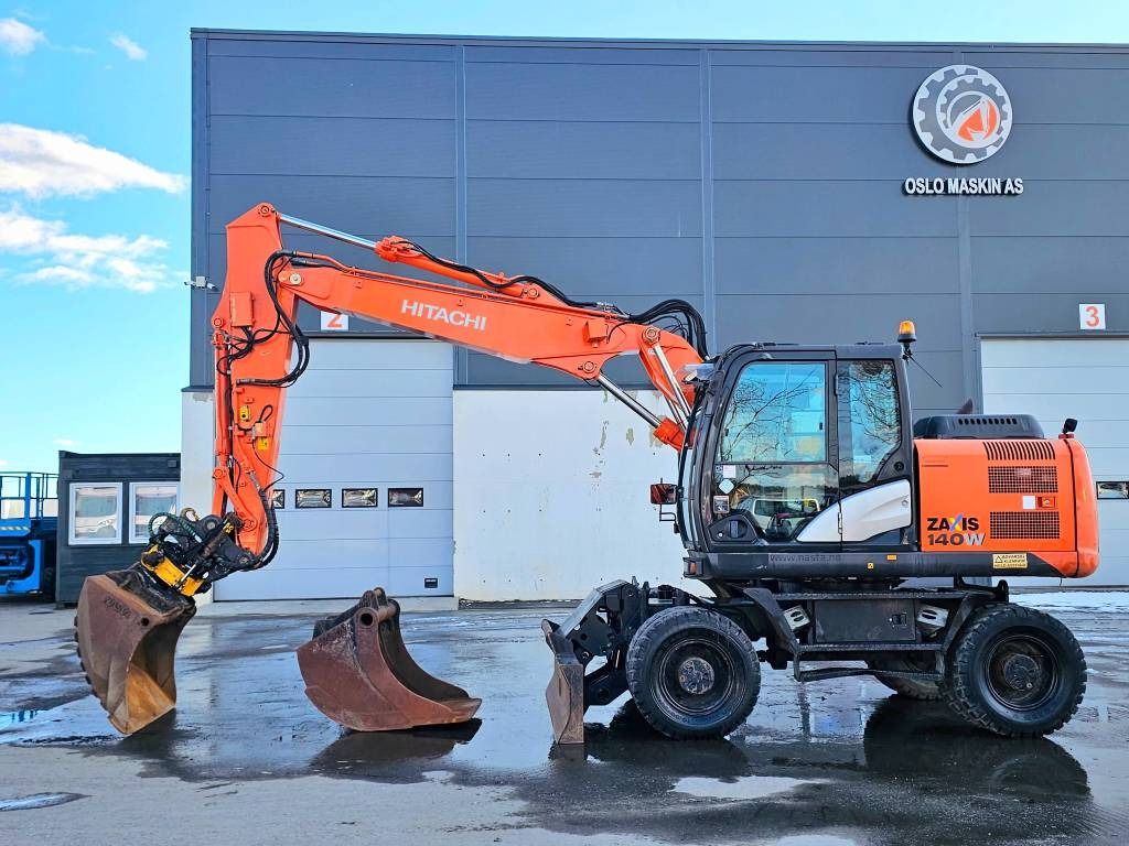 2015 Hitachi Zaxis 140W wheel excavator, side profile view