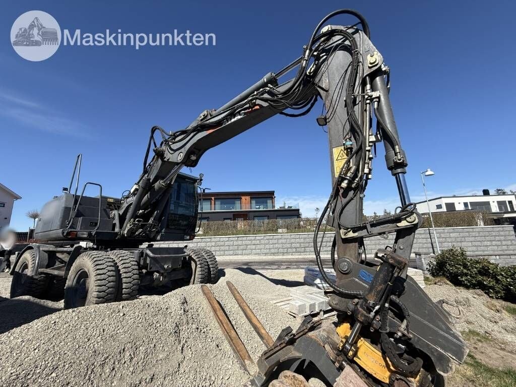 2012 Atlas 160W wheel excavator, side view