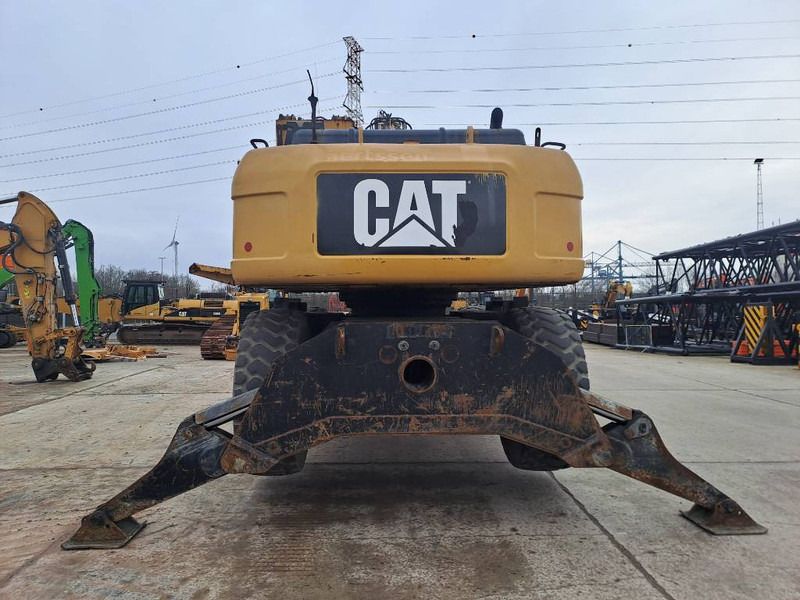 2009 Caterpillar M325D LMH material handler rear view 2009 Caterpillar M325D LMH material handler rear view