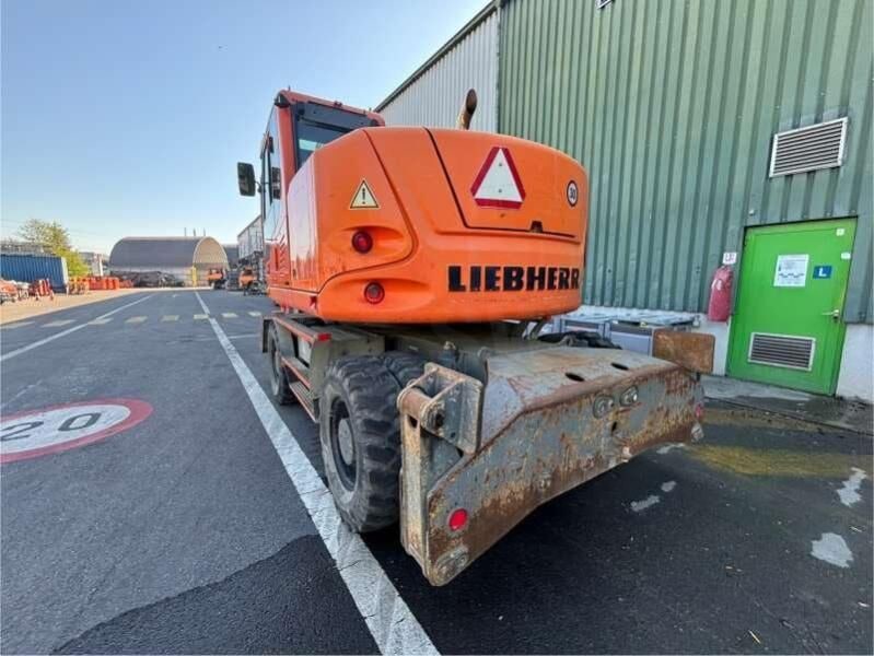2014 Liebherr A918 wheel excavator, rear three-quarter view 2014 Liebherr A918 wheel excavator, rear three-quarter view
