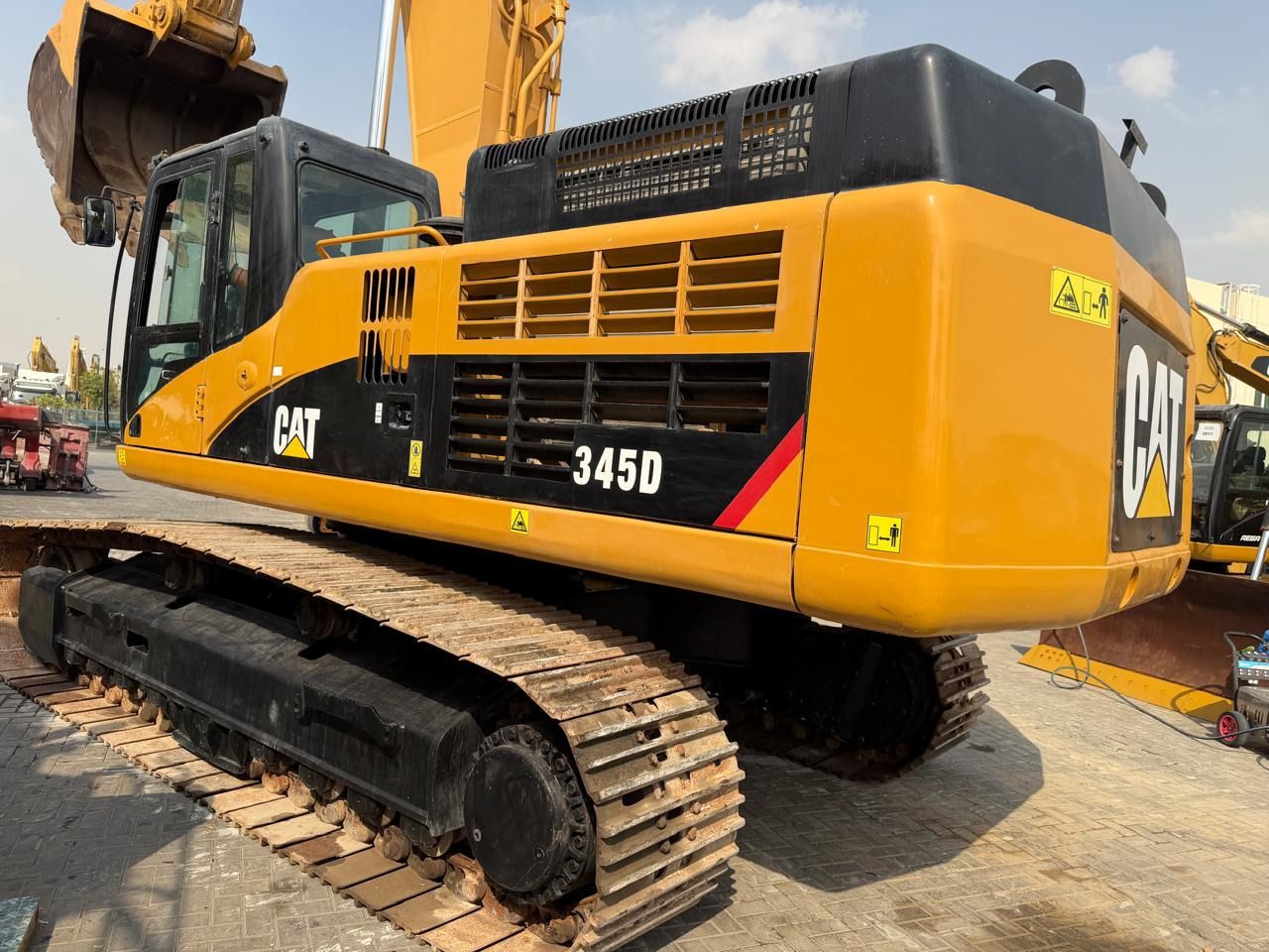 2011 Caterpillar 345D crawler excavator, rear three-quarter view 2011 Caterpillar 345D crawler excavator, rear three-quarter view