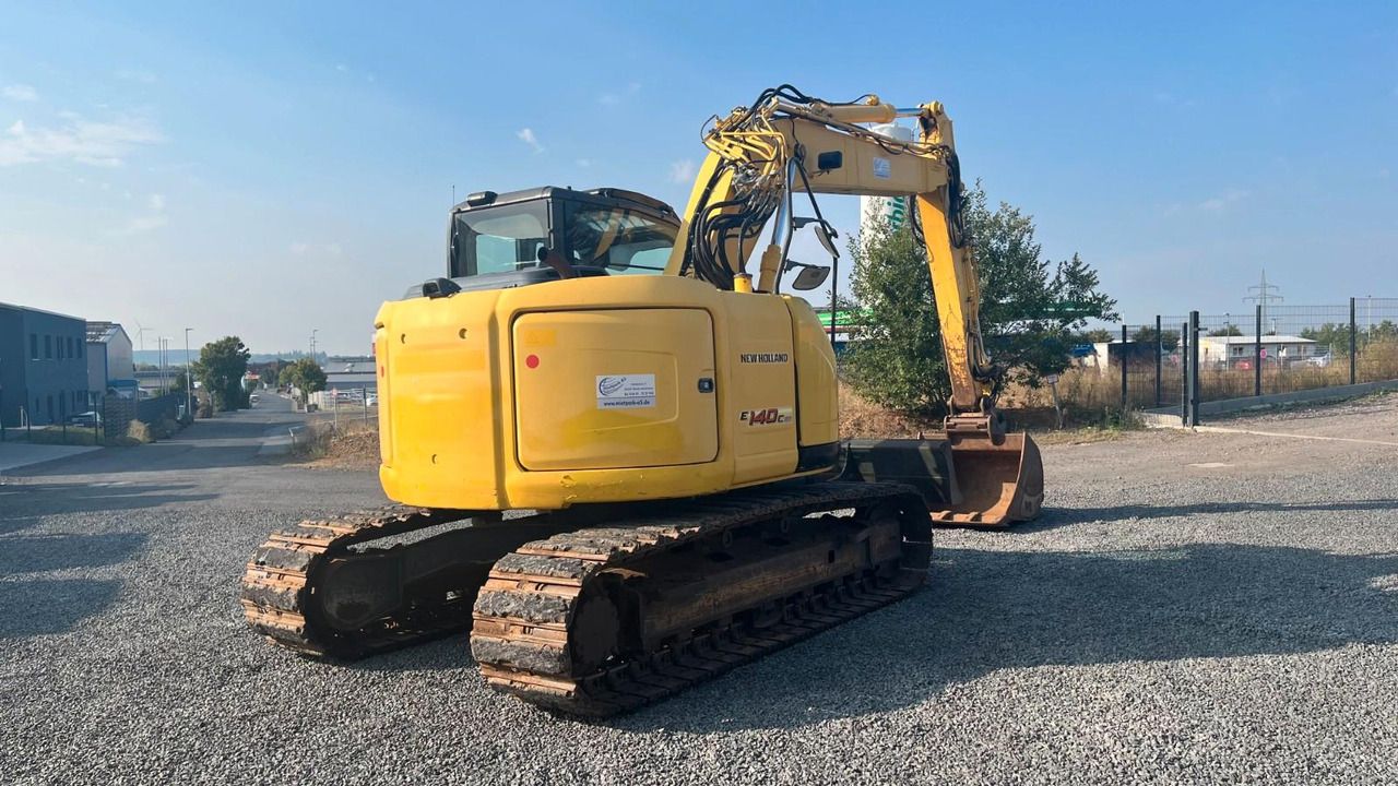 2016 New Holland E140CSR crawler excavator, rear three-quarter view