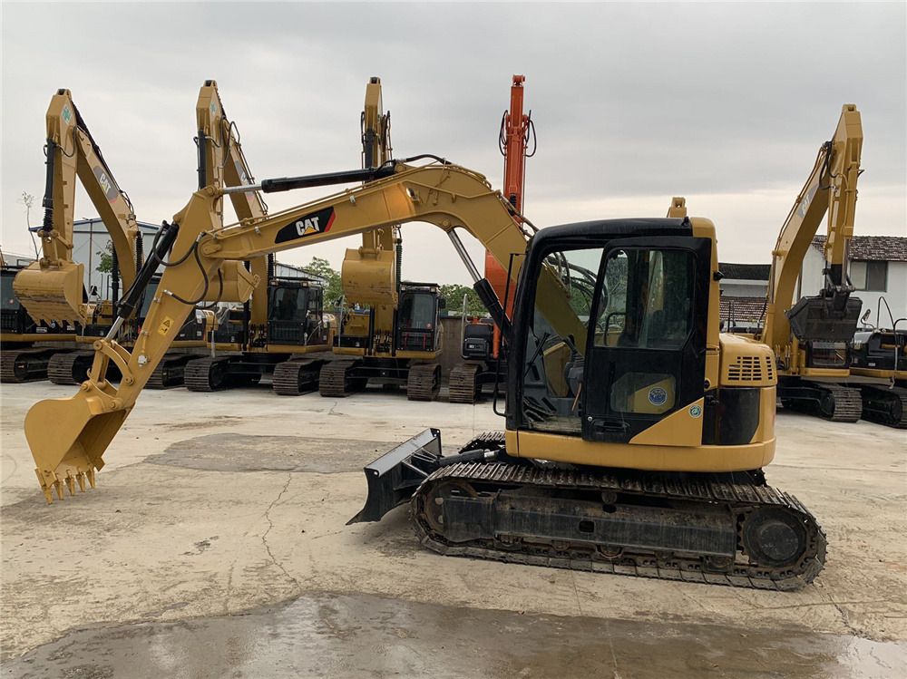 Mitsubishi 308D crawler excavator, side view Mitsubishi 308D crawler excavator, side view