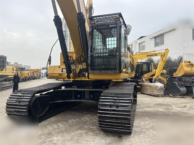 2021 Caterpillar 345D crawler excavator, rear-quarter view 2021 Caterpillar 345D crawler excavator, rear-quarter view