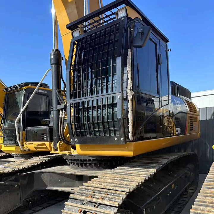 Caterpillar 336D crawler excavator, side view of cab Caterpillar 336D crawler excavator, side view of cab