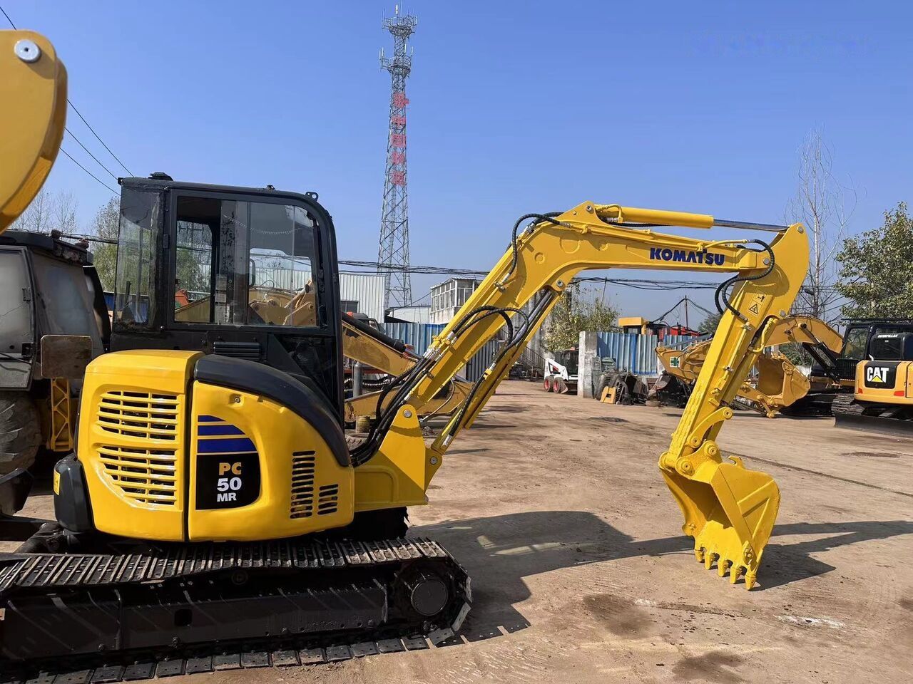 2022 Komatsu PC50 MR mini excavator, side view 2022 Komatsu PC50 MR mini excavator, side view