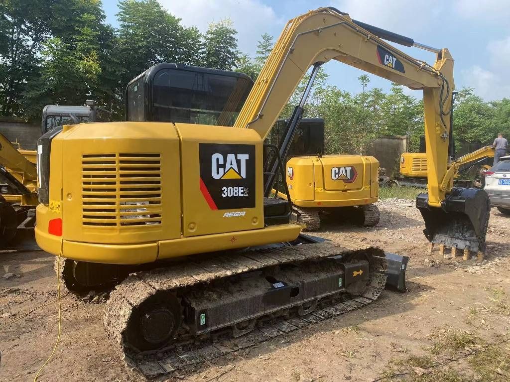2024 Caterpillar 308E2 mini excavator rear three-quarter view