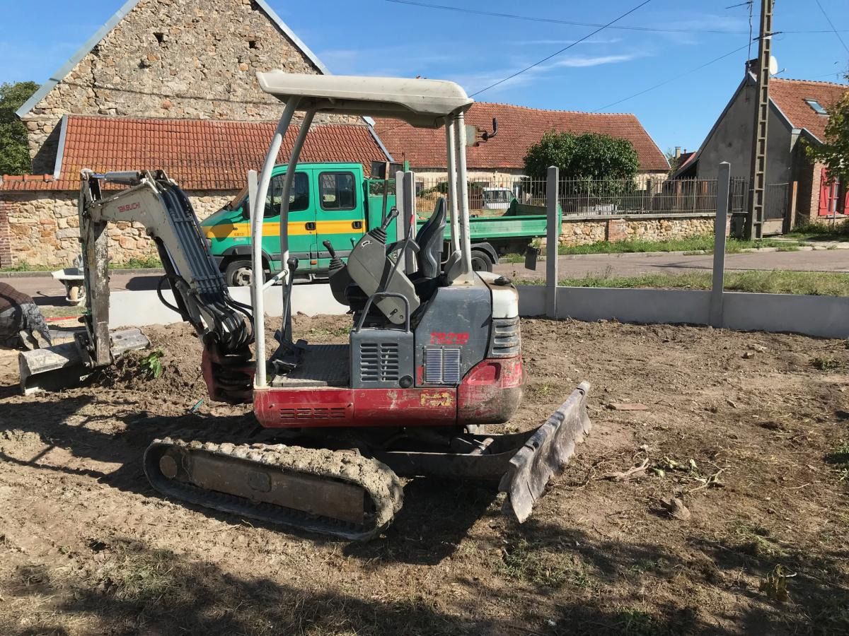 2012 Takeuchi TB219 mini excavator, side view