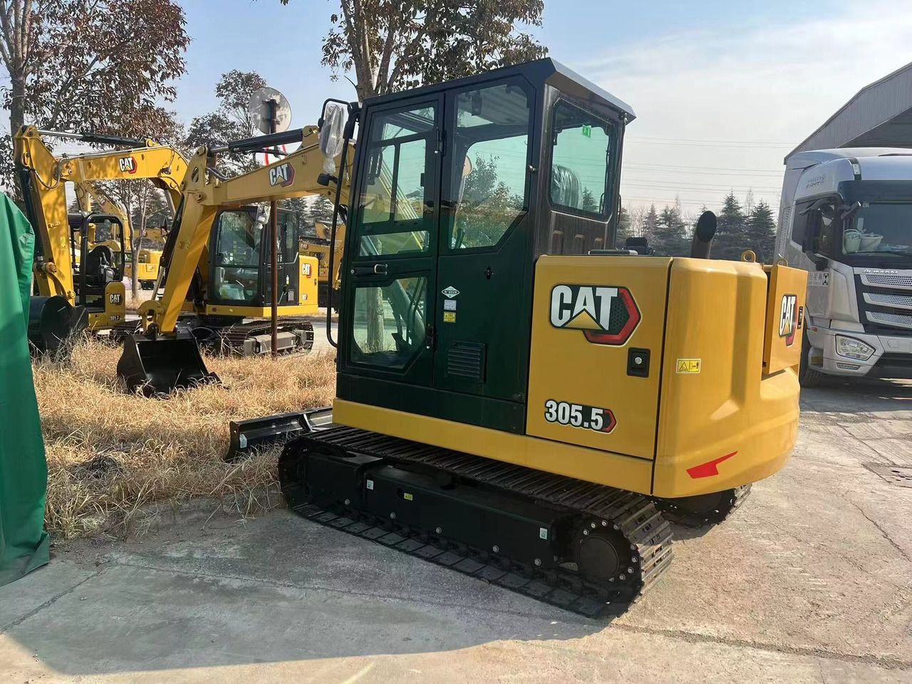 2026 Caterpillar 305.5 mini excavator, rear three-quarter view 2026 Caterpillar 305.5 mini excavator, rear three-quarter view