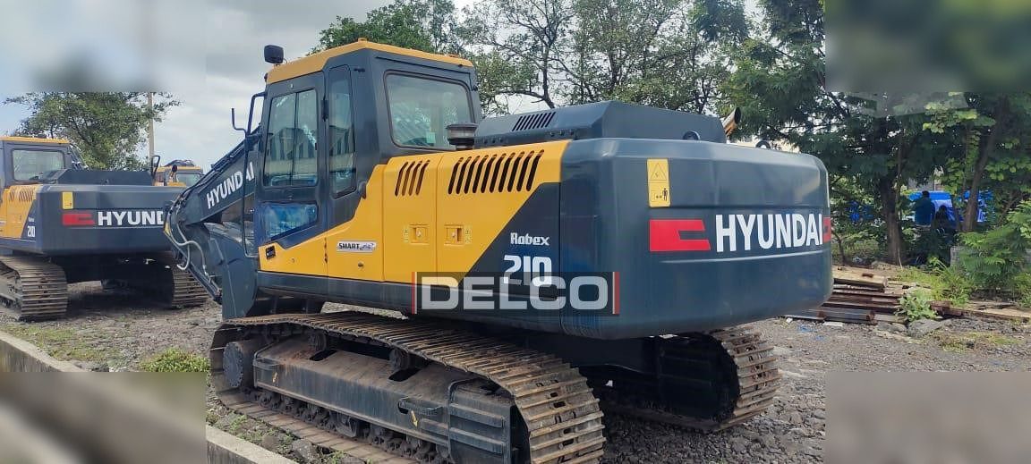 2026 Hyundai Robex 210 crawler excavator, rear three-quarter view