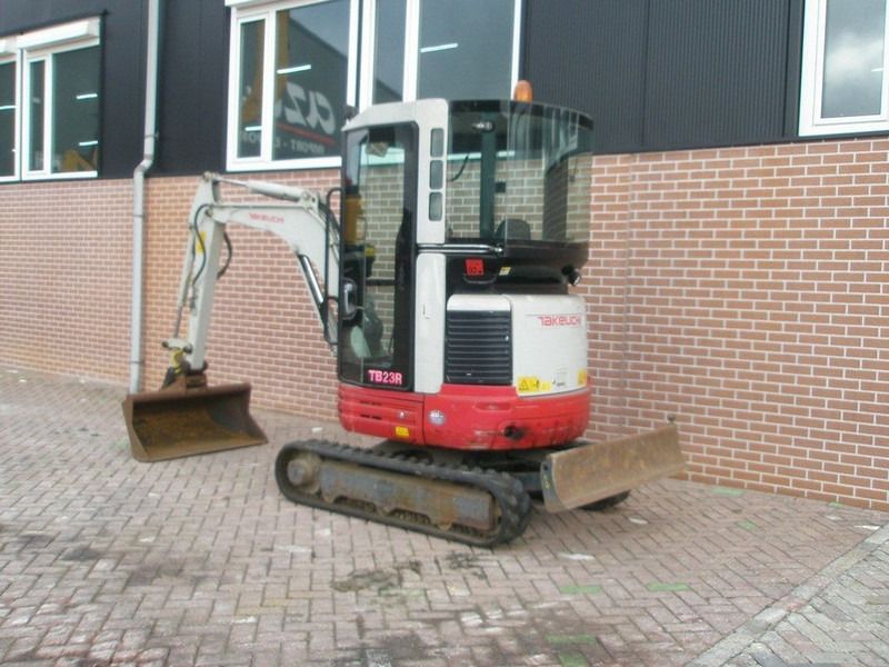 2012 Takeuchi TB23R mini excavator, front three-quarter view 2012 Takeuchi TB23R mini excavator, front three-quarter view