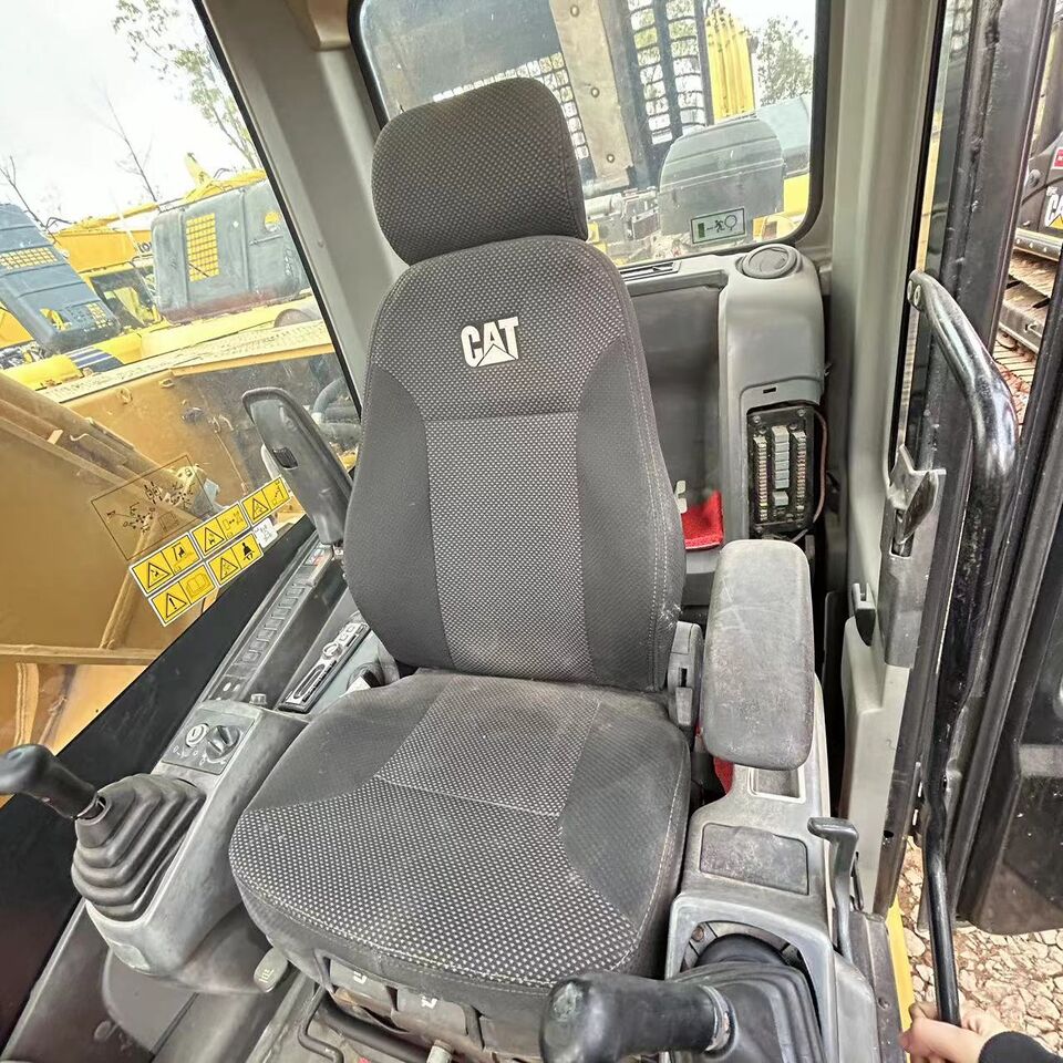 Caterpillar 325D Crawler Excavator interior cab view Caterpillar 325D Crawler Excavator interior cab view