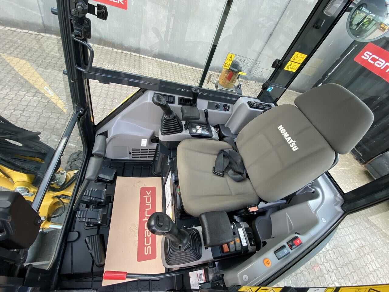 2023 Komatsu PC24MR-5 mini excavator interior cab view 2023 Komatsu PC24MR-5 mini excavator interior cab view