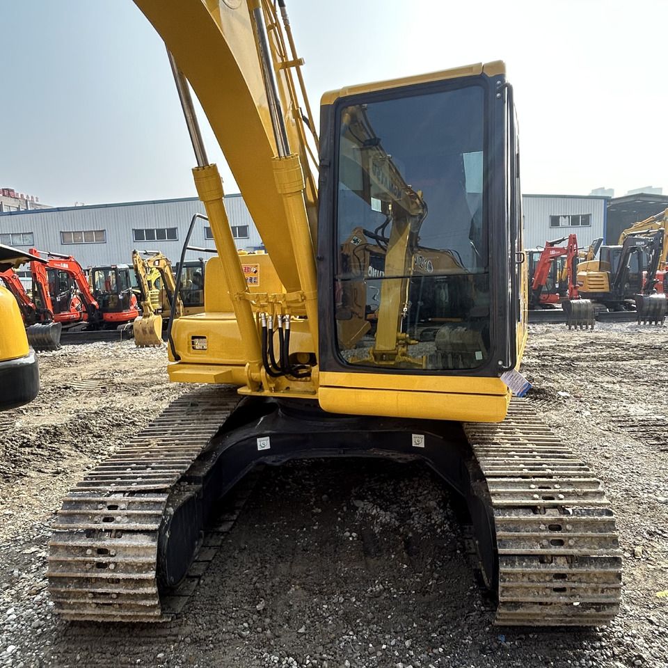 2014 Komatsu PC120-8 crawler excavator, front view of cab and boom 2014 Komatsu PC120-8 crawler excavator, front view of cab and boom