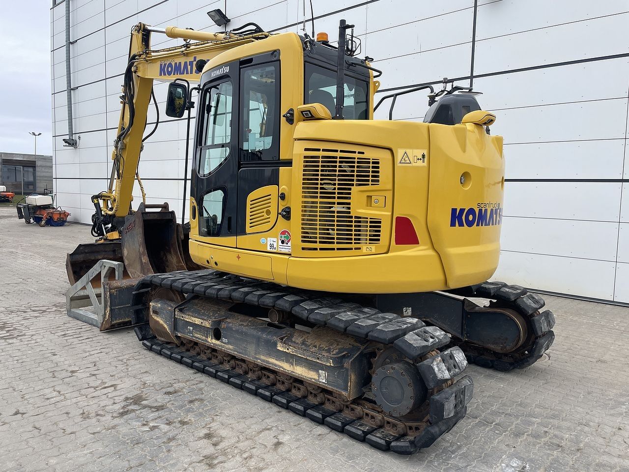 2022 Komatsu PC138US-11 crawler excavator, rear three-quarter view