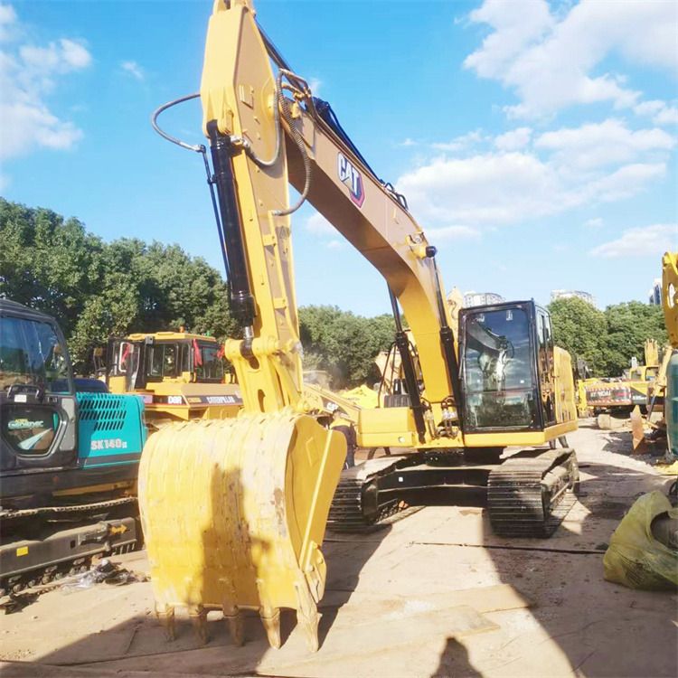 2018 Caterpillar 320GC crawler excavator, front three-quarter view