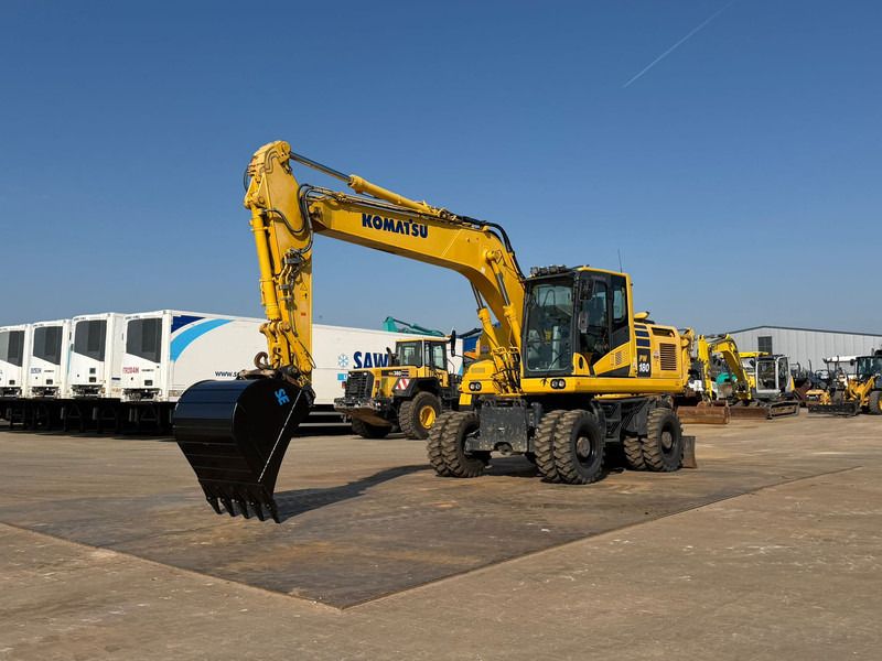 2019 Komatsu PW180-11 wheel excavator, front three-quarter view 2019 Komatsu PW180-11 wheel excavator, front three-quarter view