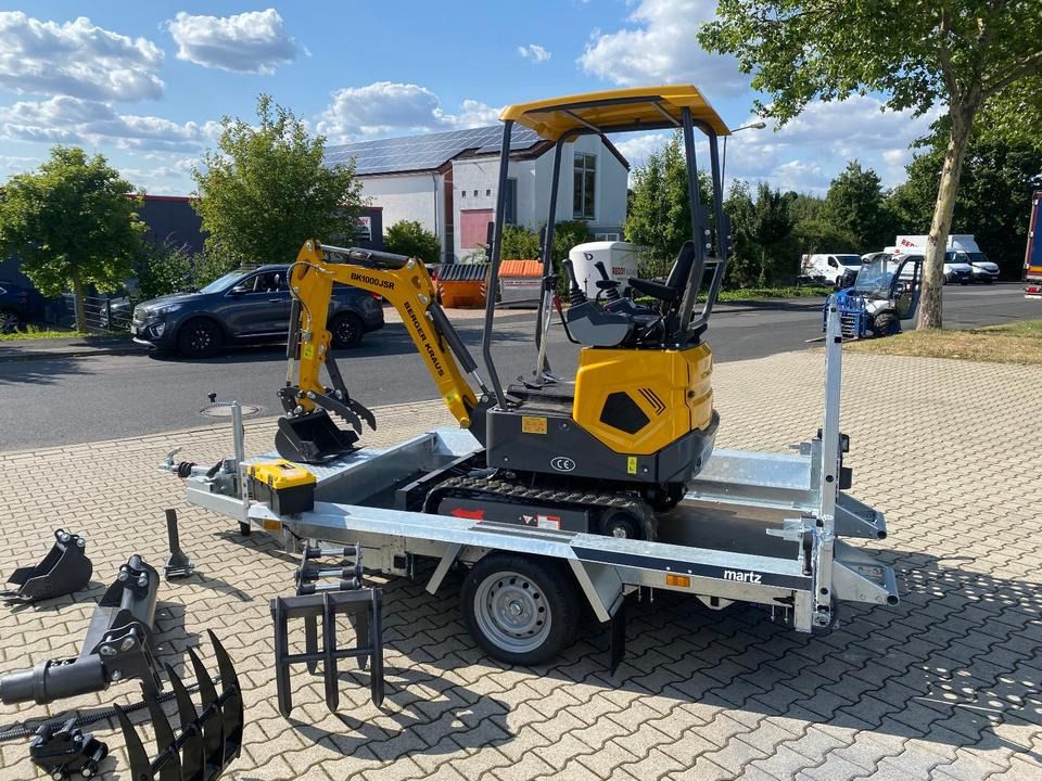 Berger Kraus BK1000JSR mini excavator on trailer, side view Berger Kraus BK1000JSR mini excavator on trailer, side view