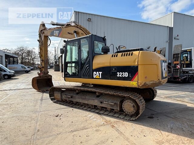 2011 Caterpillar 323DL crawler excavator, side view