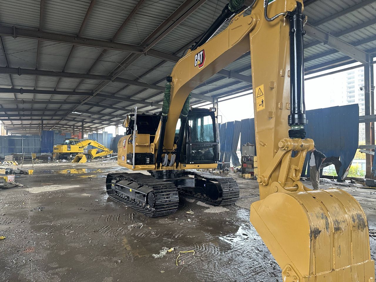 2022 Caterpillar 315D crawler excavator, front three-quarter view 2022 Caterpillar 315D crawler excavator, front three-quarter view