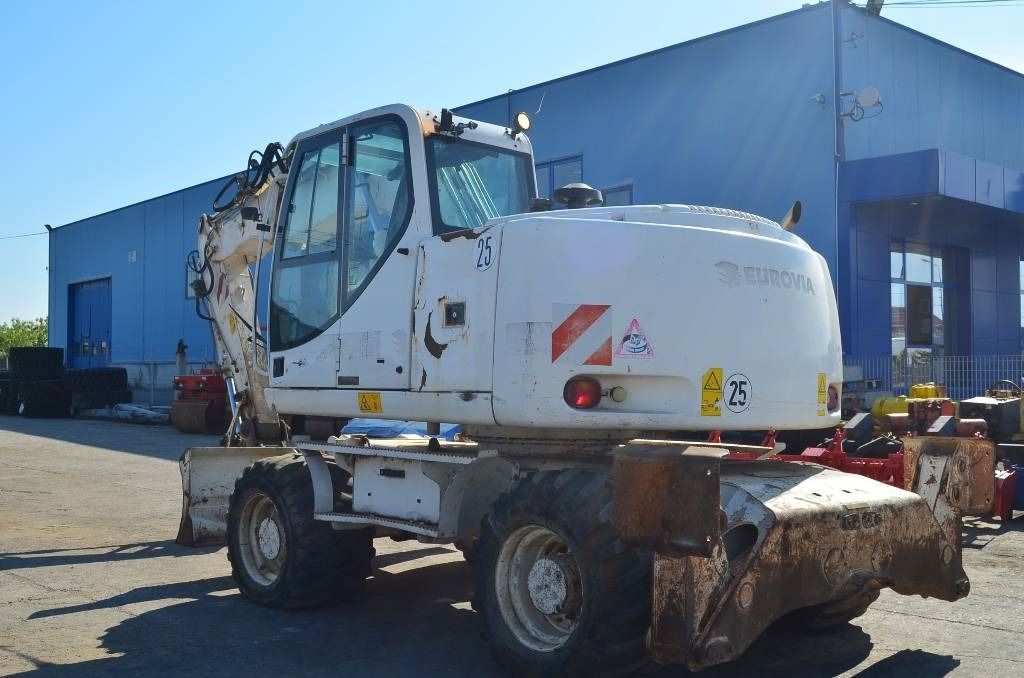 2008 CASE WX145 wheel excavator, rear three-quarter view 2008 CASE WX145 wheel excavator, rear three-quarter view